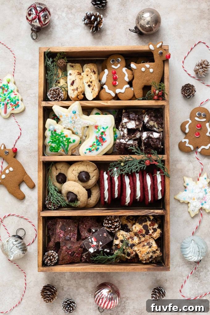 Christmas cookie box with twine, pine cones and ornament decorations