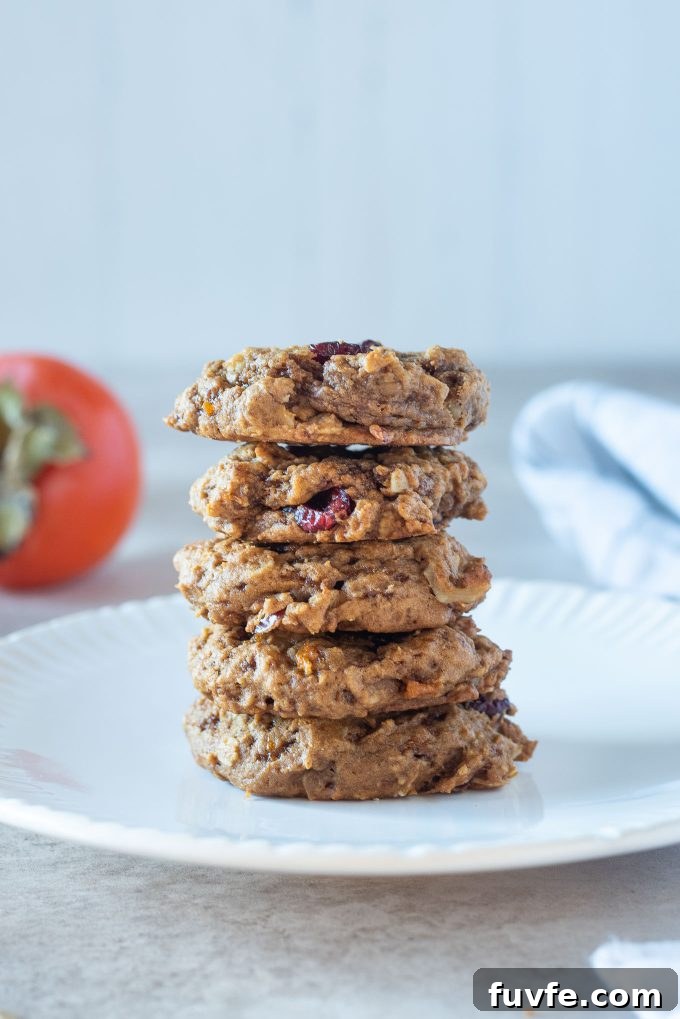 Stack of persimmon cookies on a white plate