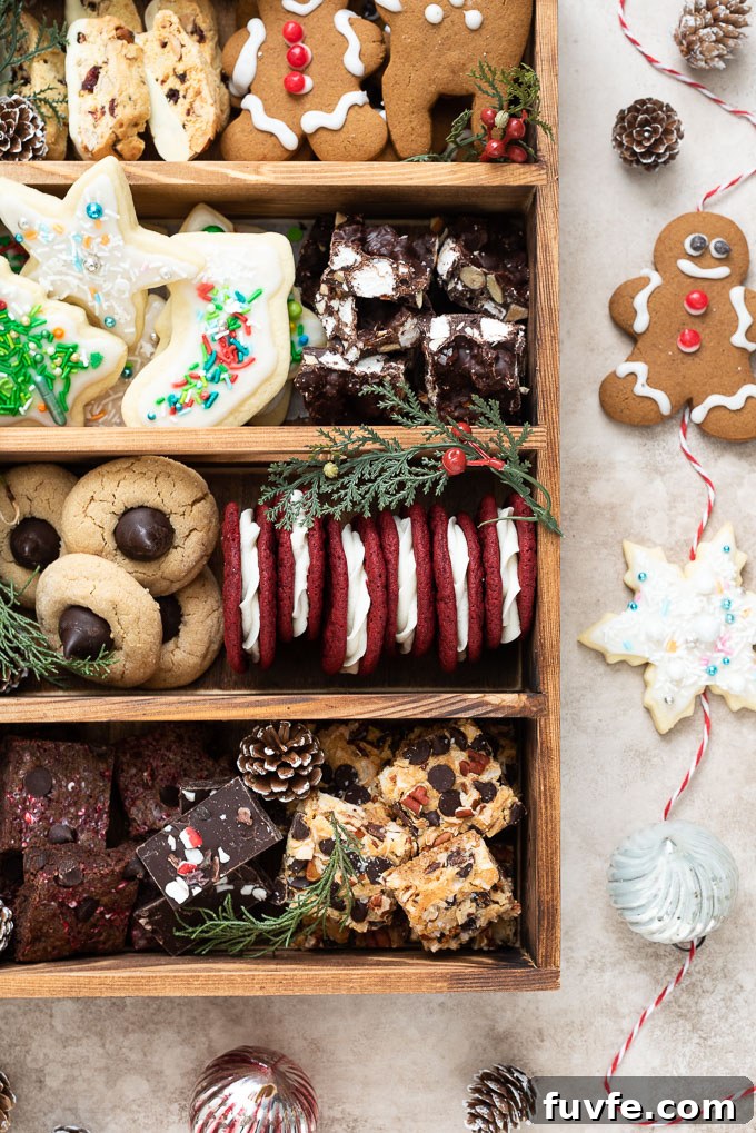 Christmas cookie box filled with cookies, candy and holiday decorations