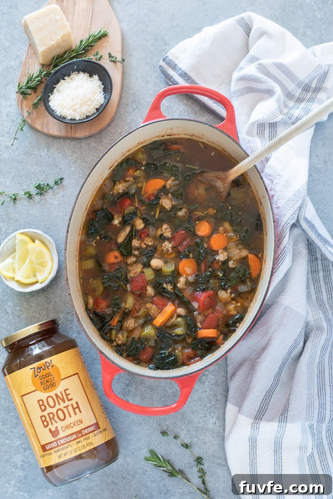 Italian sausage kale soup in a Dutch oven
