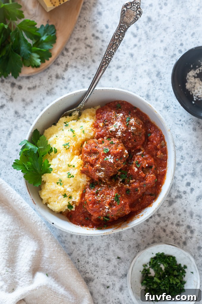 Gluten-free meatballs in a bowl with polenta