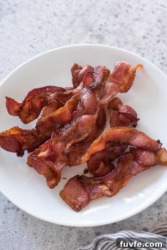 Air fryer bacon on a white plate