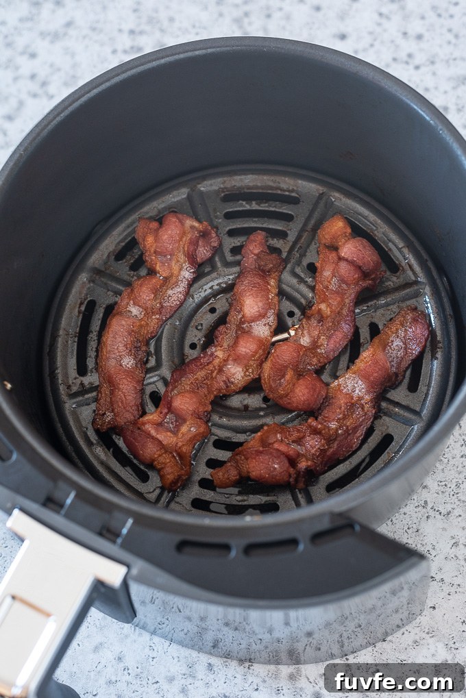 Slices of crispy bacon in air the air fryer