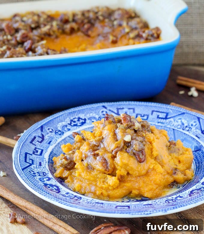 An easy recipe for Sweet Potato Casserole Lightened Up! Still packed with brown sugar, buttery goodness but with half the calories! 