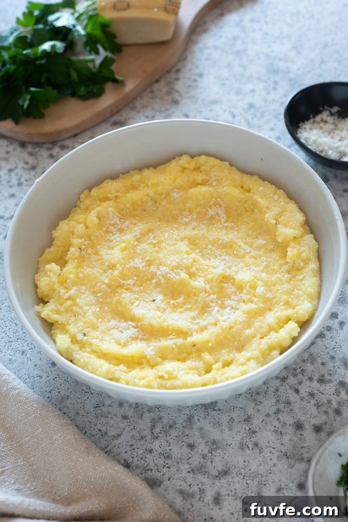 Instant Pot polenta in a bowl with parmesan