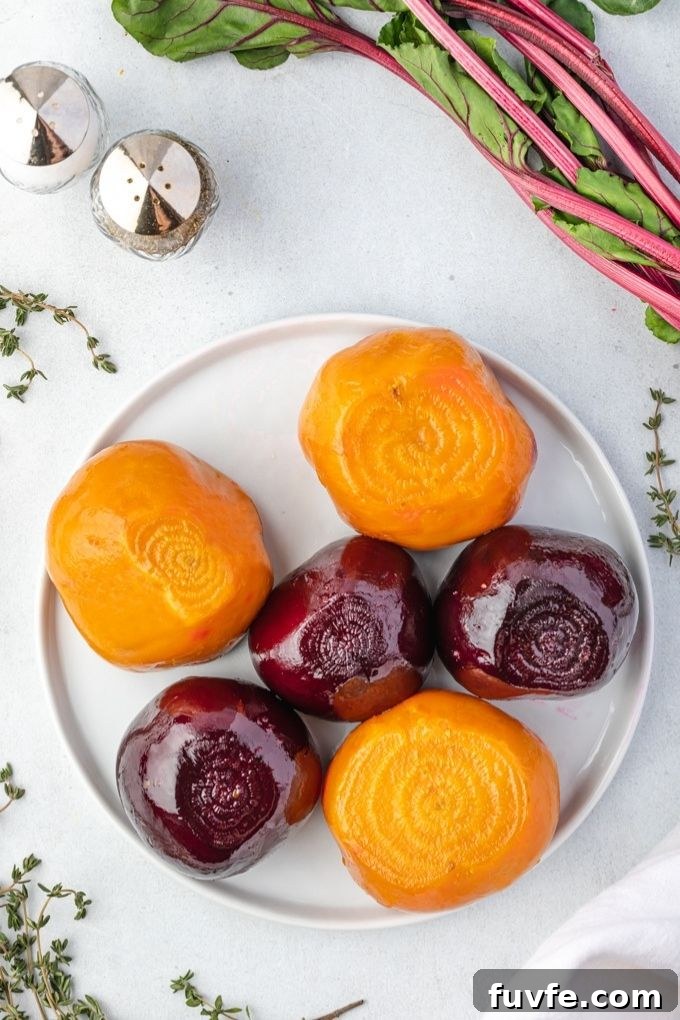 Unpeeled roasted beets on a plate