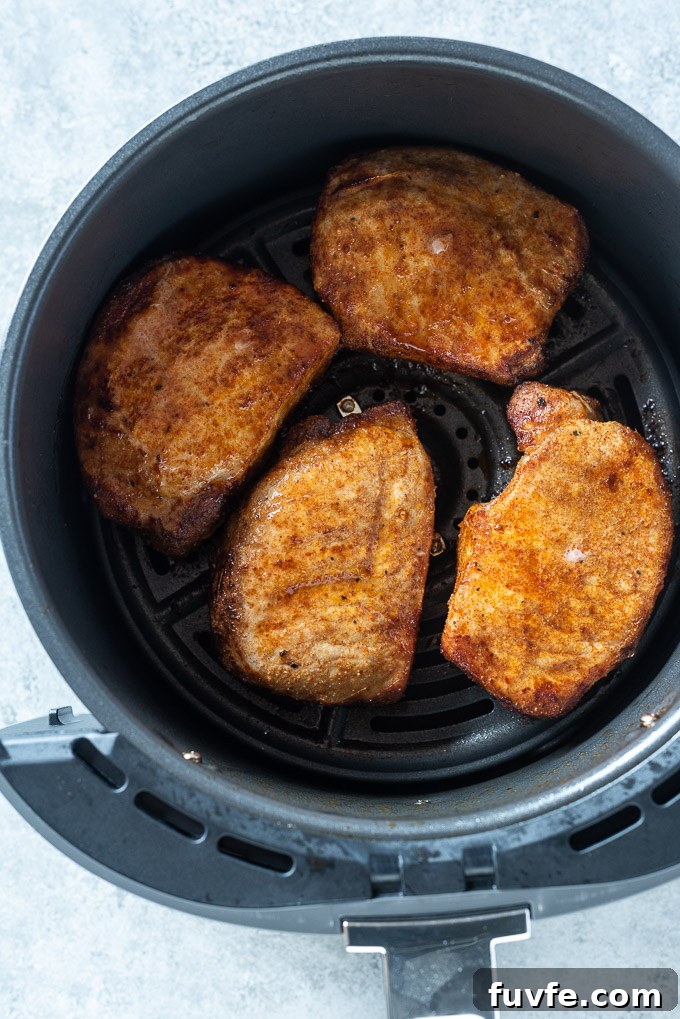 Crispy, Juicy Air Fryer Pork Chops 5 Pork chops in air fryer