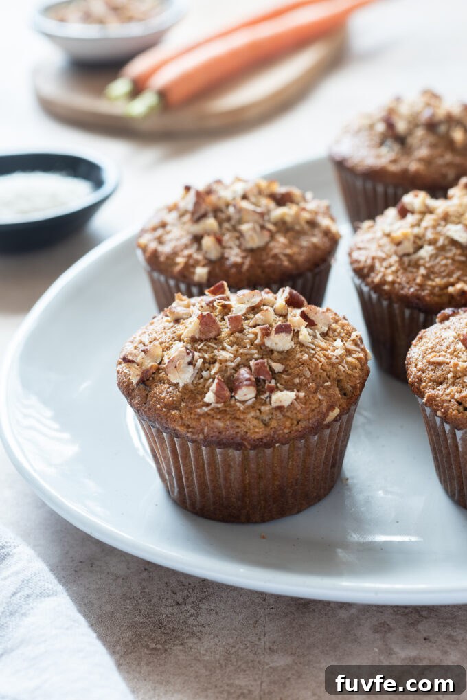 Gluten-free morning glory muffins on a platter.