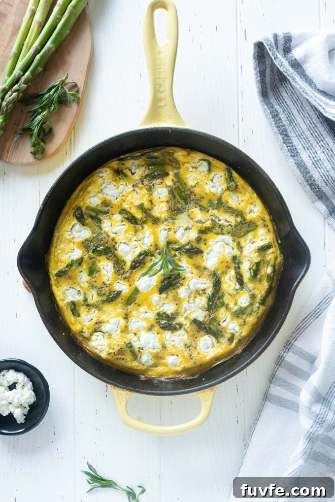 Asparagus frittata in a cast iron skillet