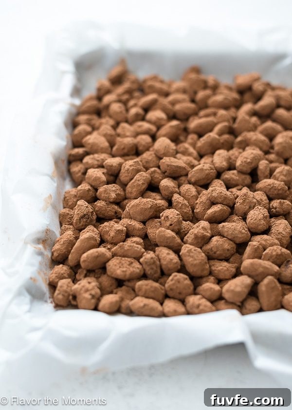 Almond Dragees: Sugar-Coated Jordan Almonds Recipe 4 Almond dragees on baking sheet