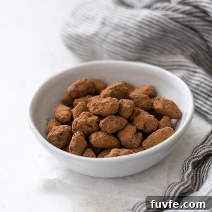 Almond Dragees: Sugar-Coated Jordan Almonds Recipe 6 Almond dragees in a white bowl with a linen