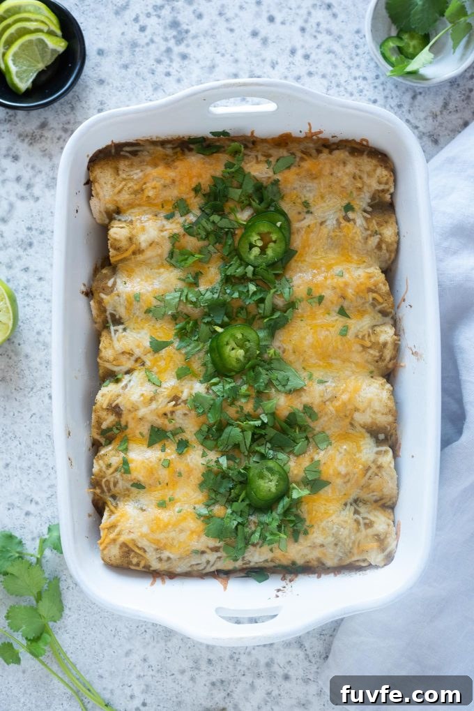 Green enchiladas in a baking dish