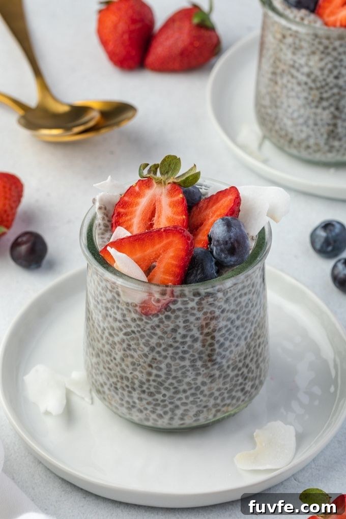 Chia seed pudding with strawberries, blueberries and coconut