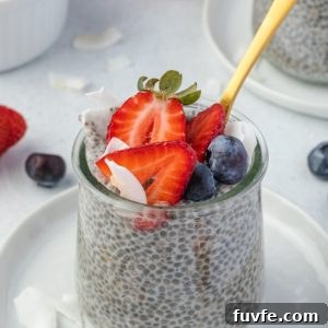 Chia seed pudding in a jar with a spoon digging in