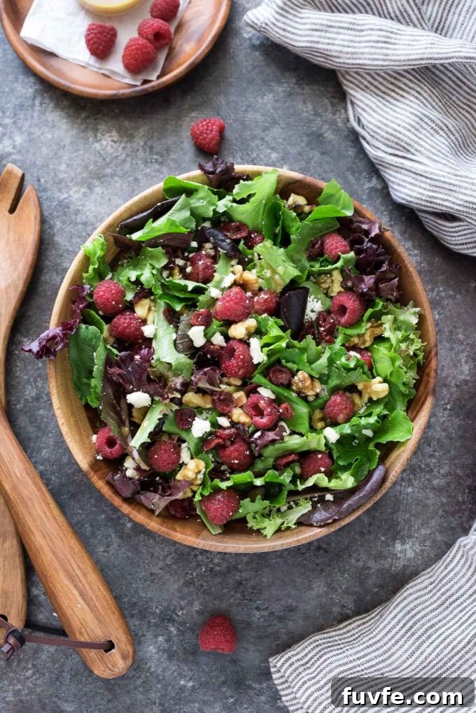 Raspberry salad in a serving bowl.