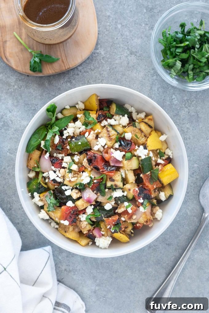 Bowl of grilled vegetable salad with linen