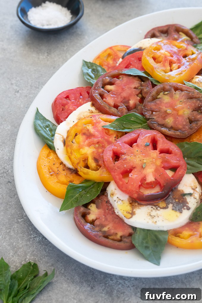 Classic Caprese Salad with Fresh Mozzarella and Balsamic Glaze 7 Tomato mozzarella salad with balsamic vinegar and olive oil