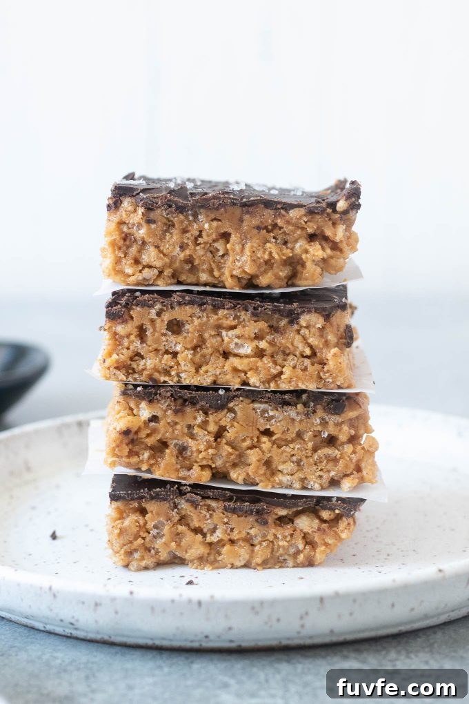 Stack of peanut butter rice krispie treats on a plate