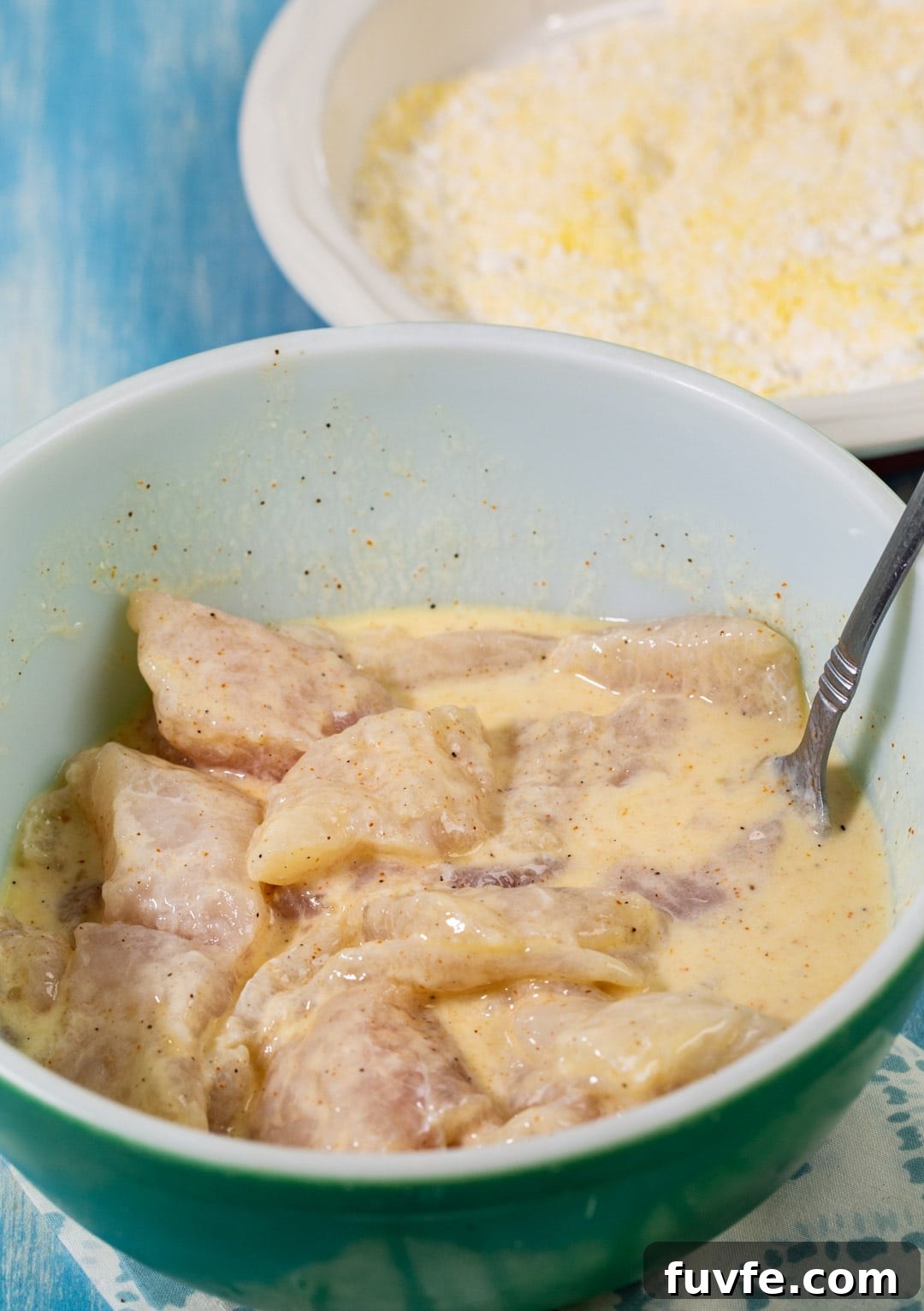 Catfish in buttermilk marinade.