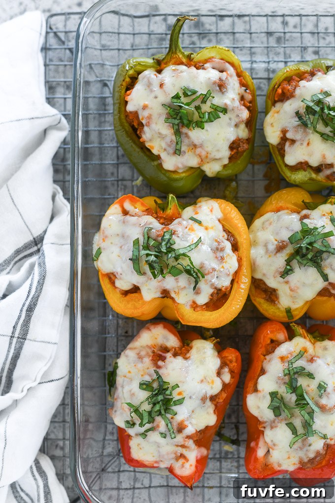 How to Make Classic Italian Stuffed Peppers 6 Italian stuffed peppers in a baking dish