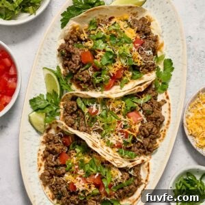 Quick Ground Beef Tacos Recipe for Weeknights 8 Ground beef tacos on a platter