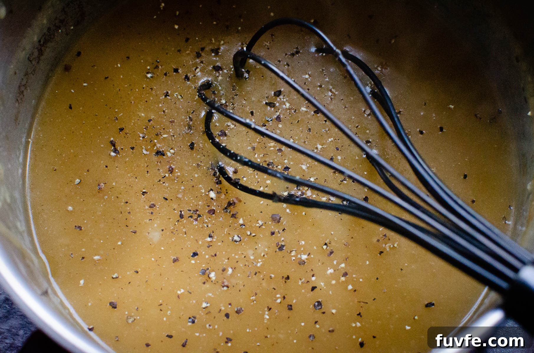Whisking lamb gravy
