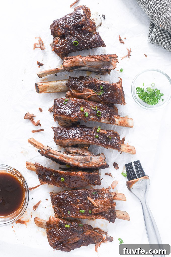 Cut Instant Pot spare ribs on parchment paper