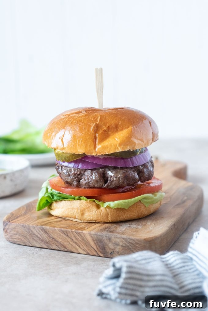 Air Fryer Hamburgers on a cutting board