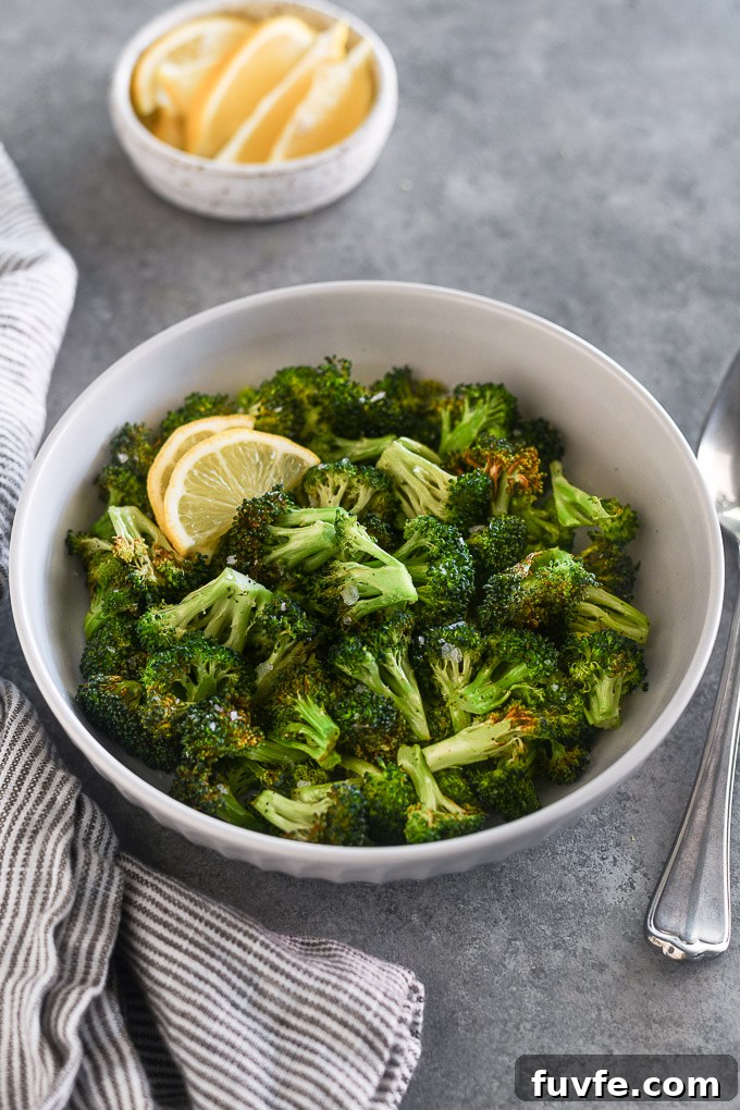 Bowl of air fryer broccoli with lemon