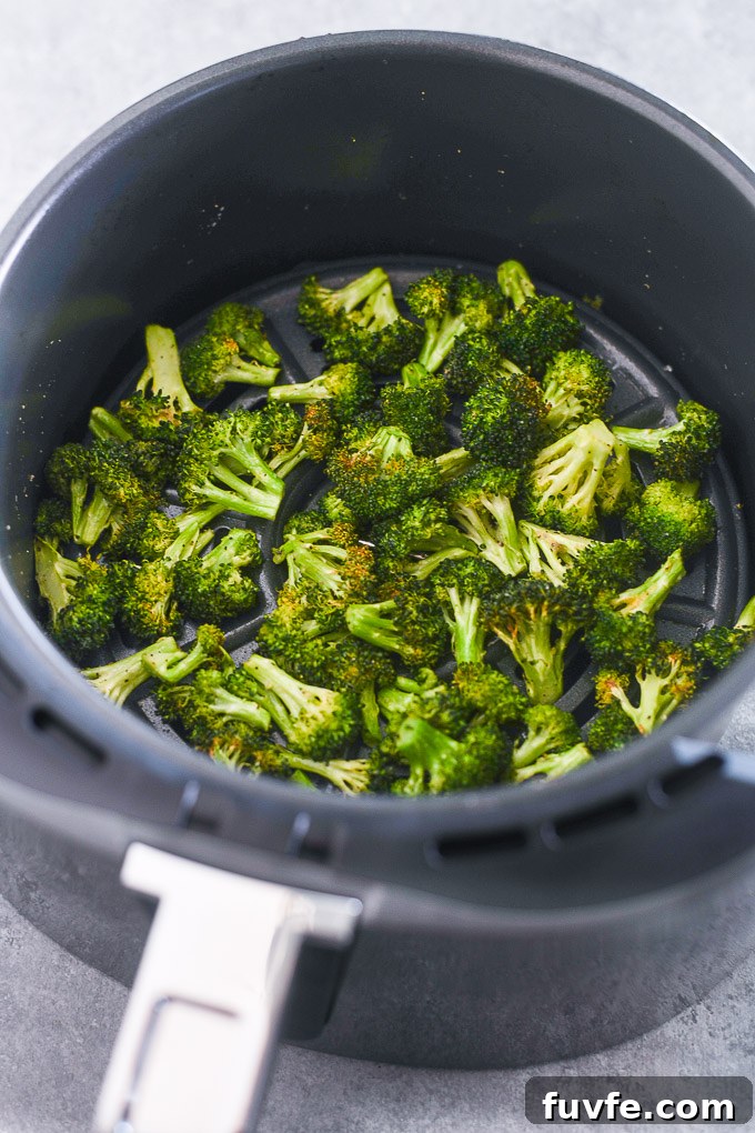 Broccoli in air fryer basket