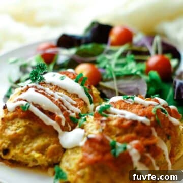 Quick No-Fuss Cabbage Roll Skillet for Busy Weeknights 20 lazy cabbage rolls drizzled with sour cream on white plate