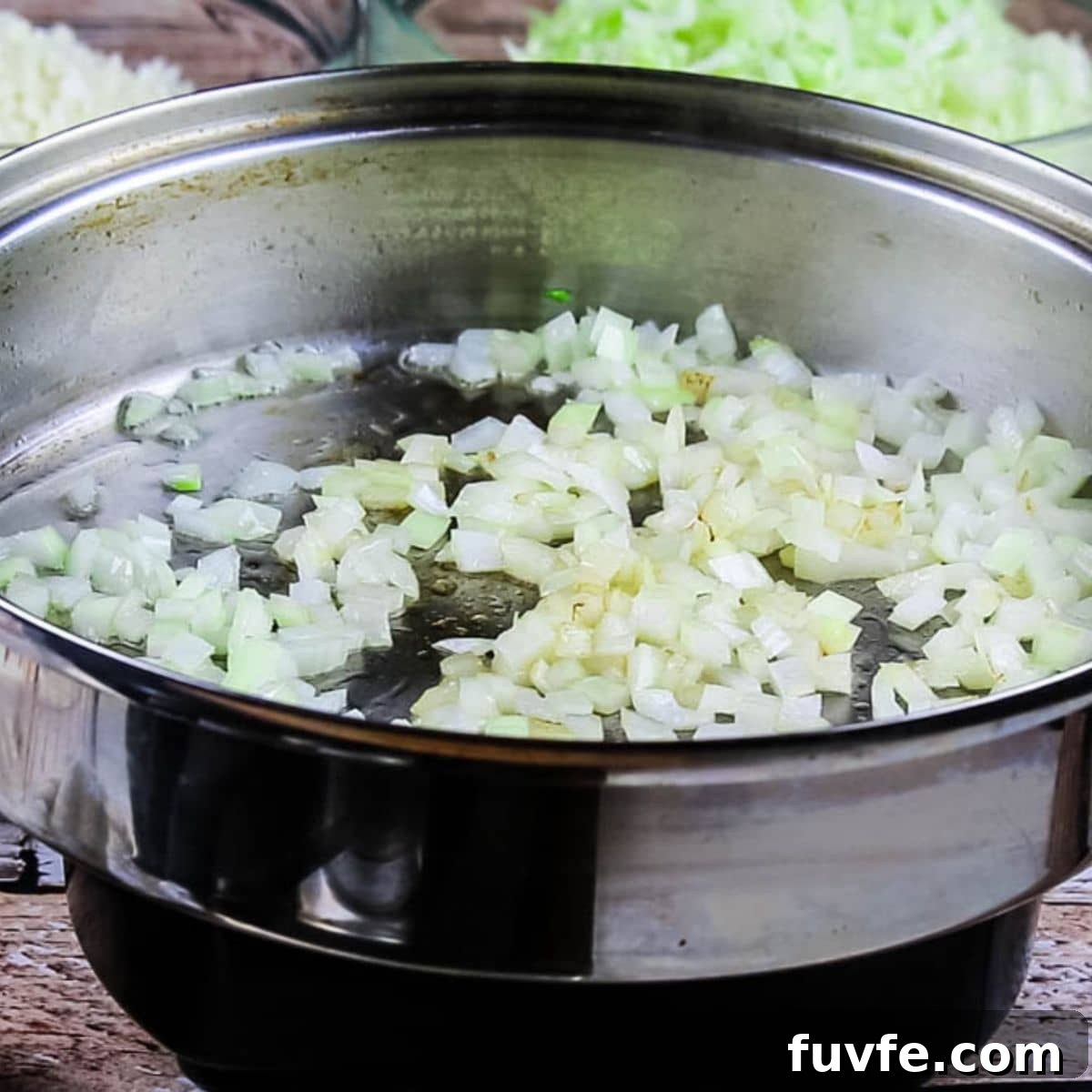 Quick No-Fuss Cabbage Roll Skillet for Busy Weeknights 6 Saute onions in a stainless steel pan.