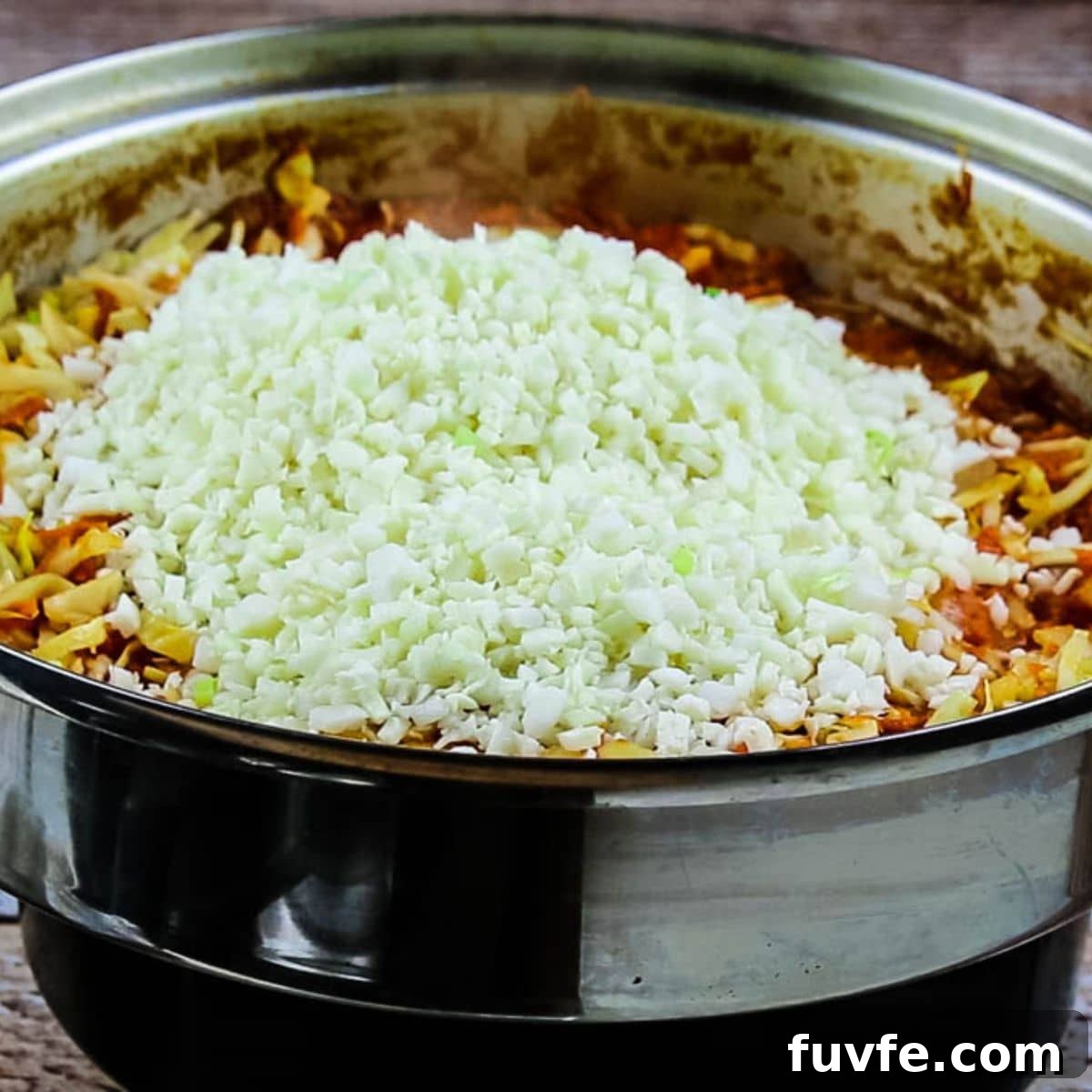 Quick No-Fuss Cabbage Roll Skillet for Busy Weeknights 9 Cauliflower added to vegetables.