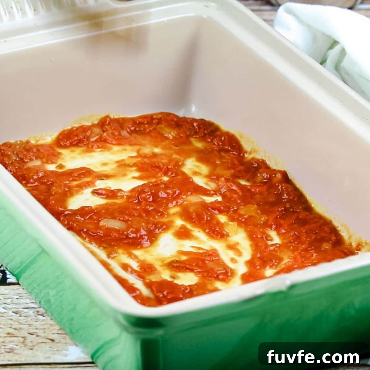 Quick No-Fuss Cabbage Roll Skillet for Busy Weeknights 10 casserole dish with tomato sauce on bottom