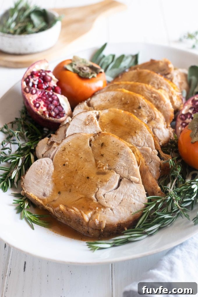 How to Roast a Juicy Boneless Turkey Breast 2 Boneless turkey breast sliced and covered with gravy