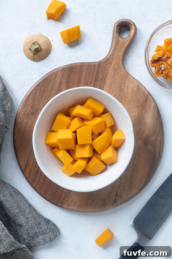 How to Peel, Trim and Cube Butternut Squash for Recipes 9 Cubed butternut squash in a bowl