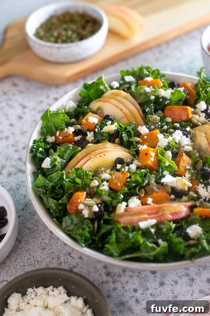 Fall harvest salad with butternut squash and apple in a bowl