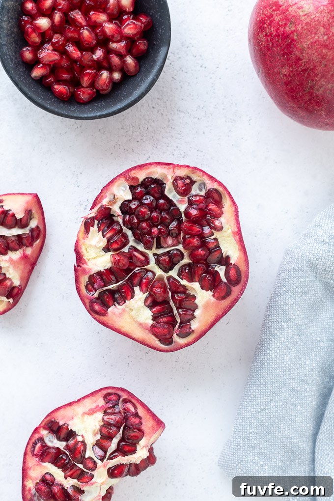 45 Pomegranate Recipes and Complete Produce Guide 5 Pomegranate cut in half