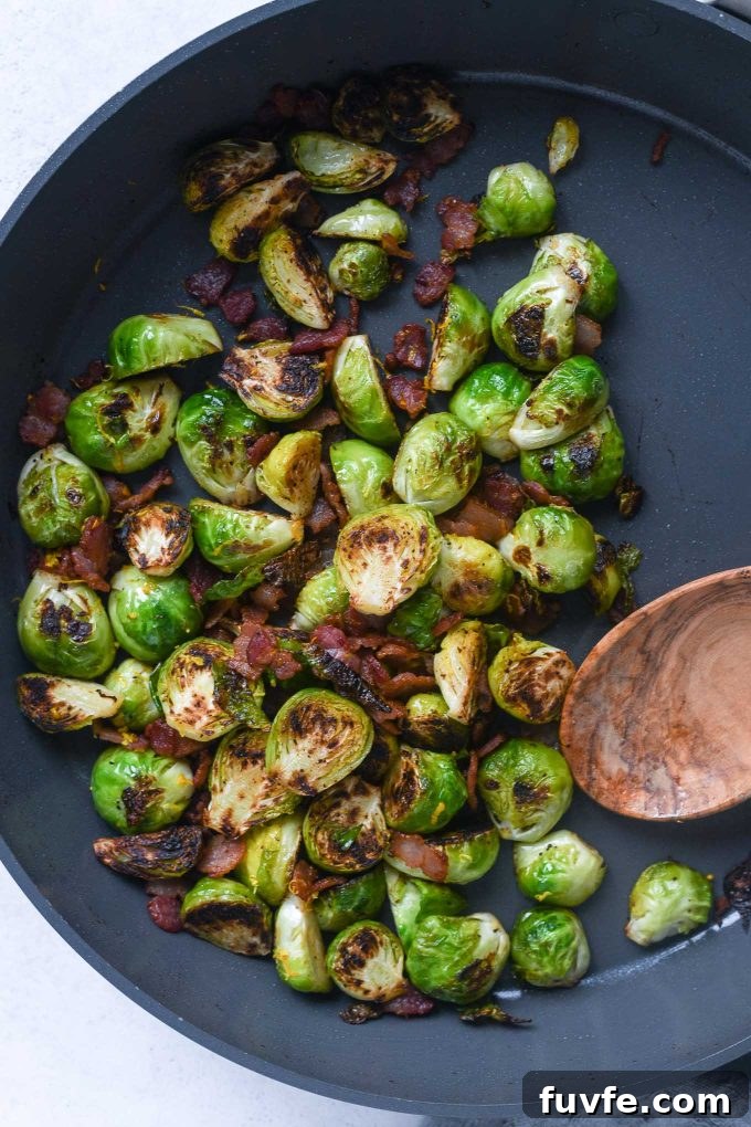 Crispy Roasted Brussels Sprouts with Bacon 2 Brussels sprouts and bacon in a pan