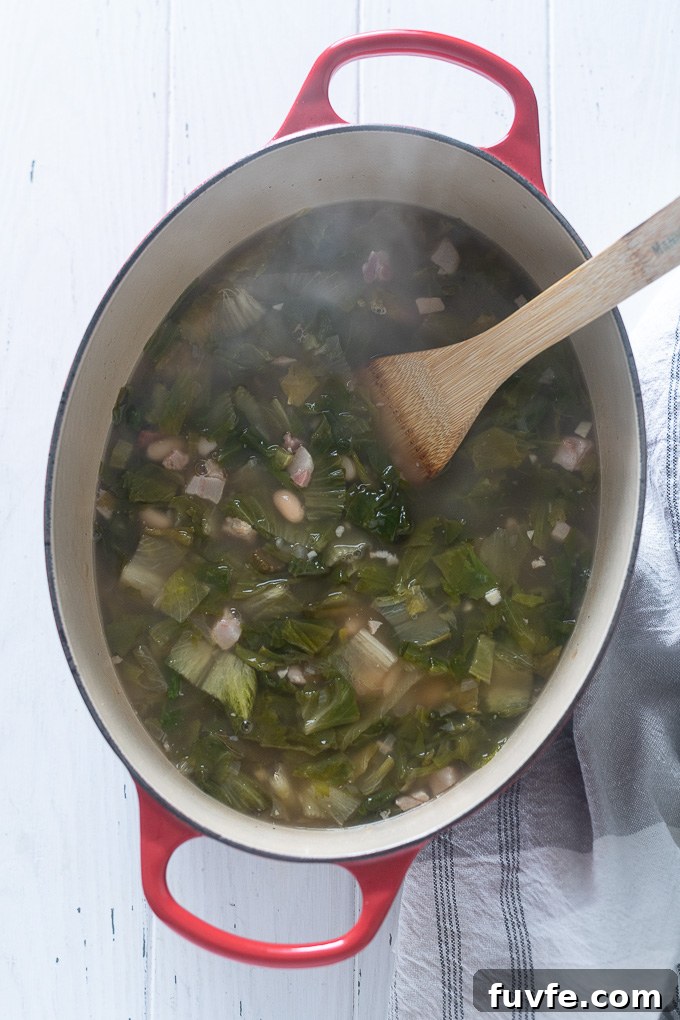 White Bean Escarole Soup in a dutch oven