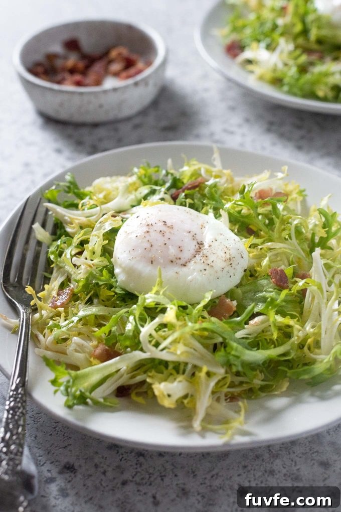 27 Chicory Recipes: How to Buy and Cook Chicory 7 Salade lyonnaise on a plate of frisée lettuce