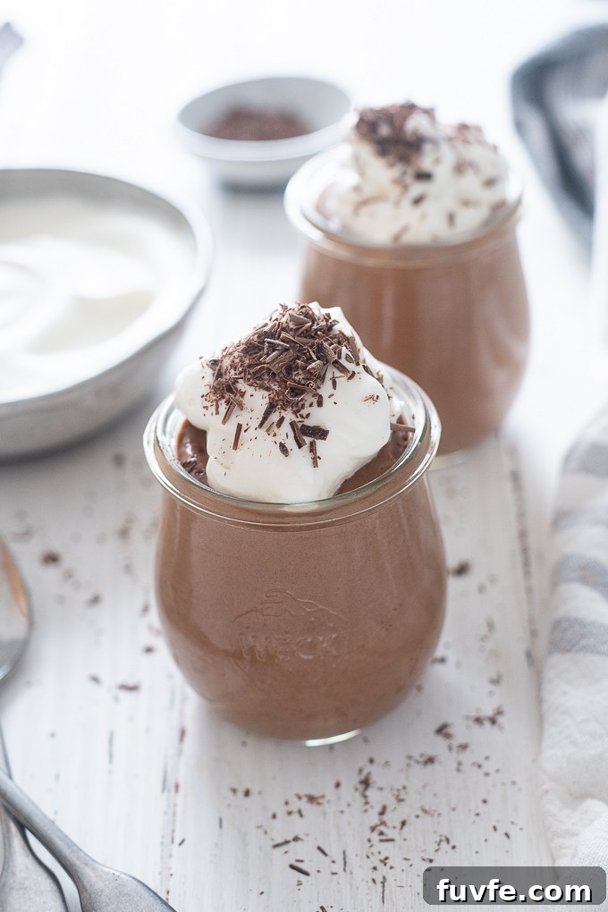 Silky No-Bake Chocolate Mousse Recipe 3 Dark chocolate mousse with whipped cream and shaved chocolate