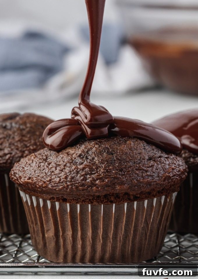 Chocolate Ganache Recipe for Glossy Glaze and Filling 3 Chocolate ganache drizzling over a cupcake