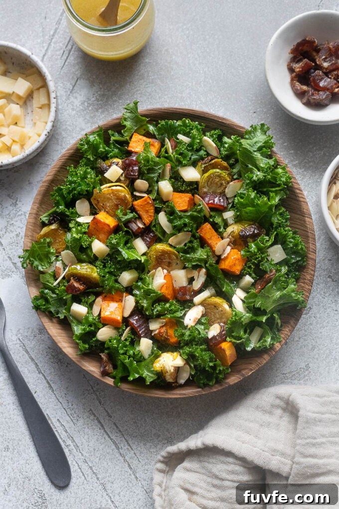 Winter roasted vegetable kale salad in a serving bowl.
