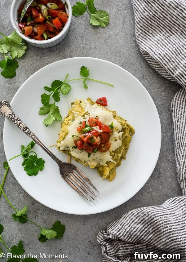 chicken verde enchilada bake on plate with salsa overhead shot