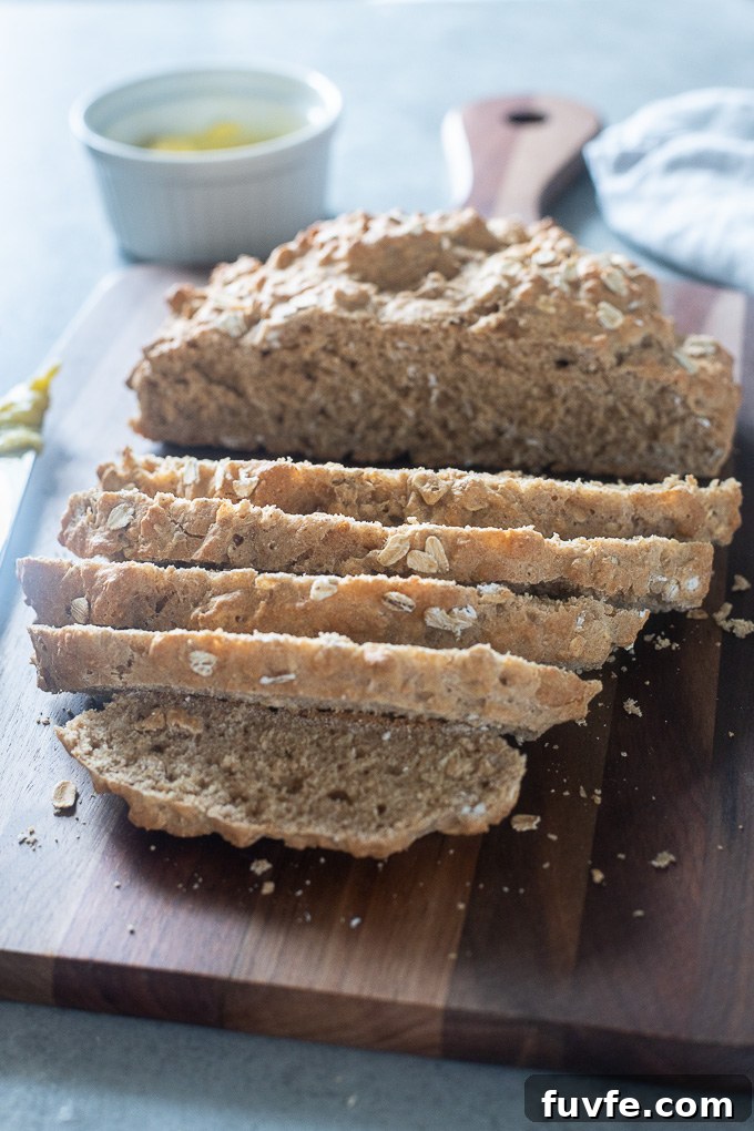 Traditional Irish Brown Soda Bread Recipe 3 Irish brown soda bread sliced on a cutting board