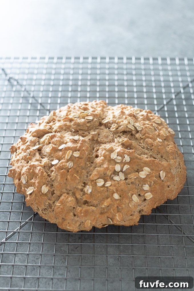Traditional Irish Brown Soda Bread Recipe 6 Loaf of Irish brown bread on a wire rack