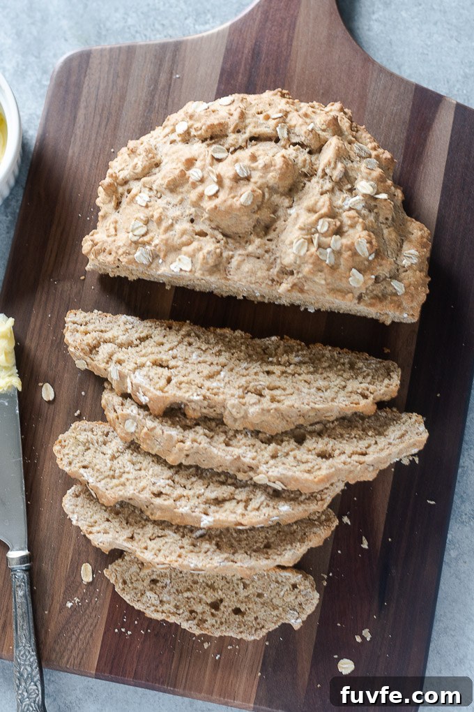 Loaf of Irish brown bread partially sliced