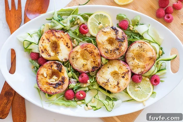 Serrano Honey Grilled Peaches / This simple summer salad is made with sweet grilled peaches and topped with a sweet and spicy vinaigrette.
