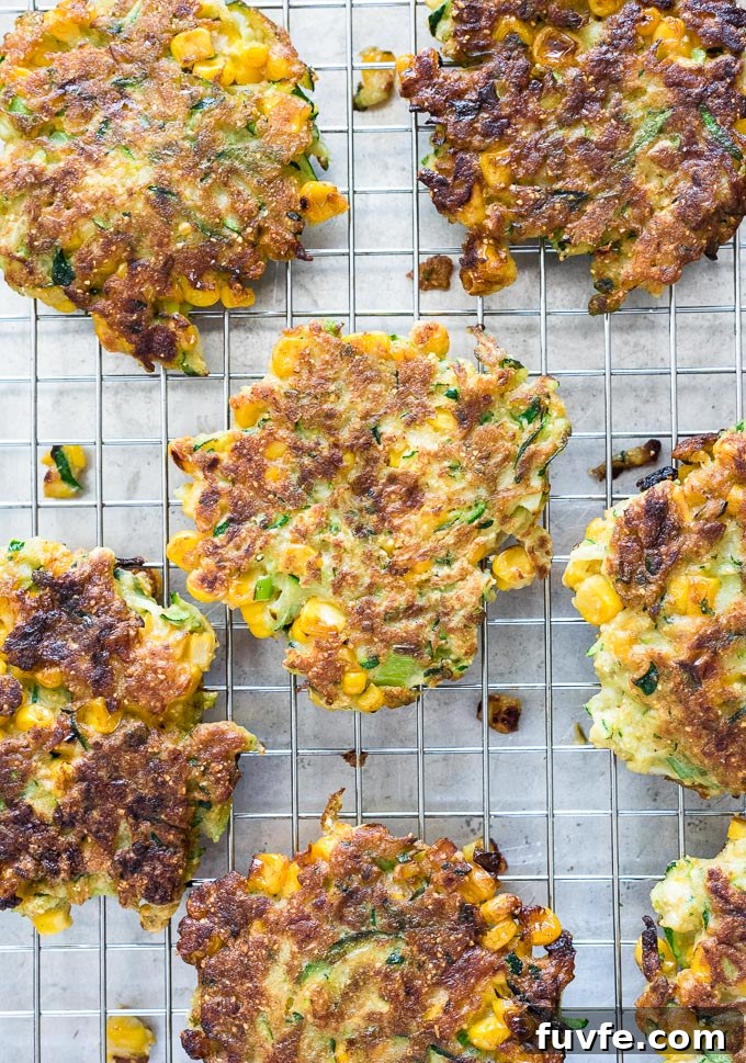 Zucchini and corn fritters on a wire rack